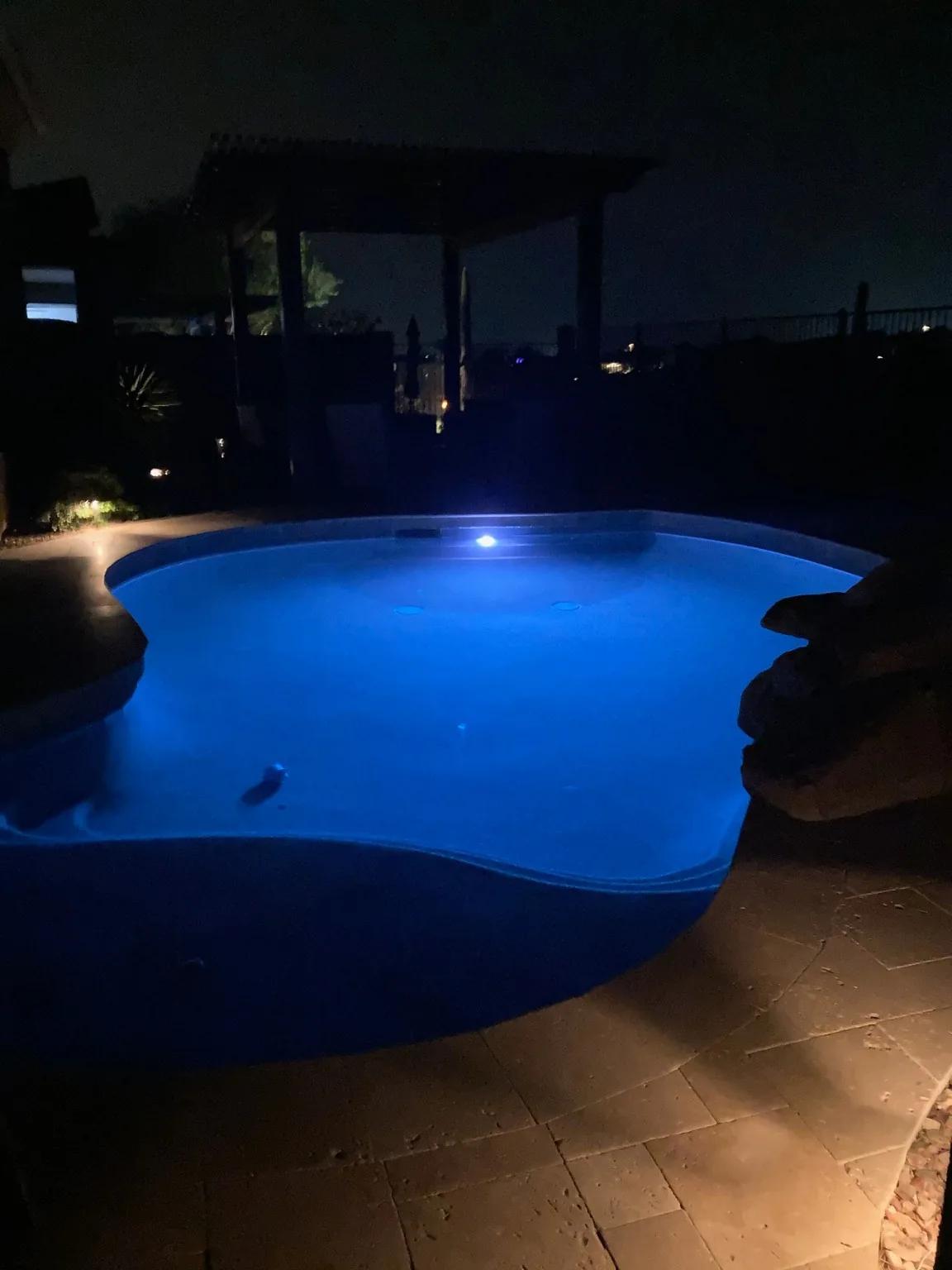 Swimming pool with blue night lighting